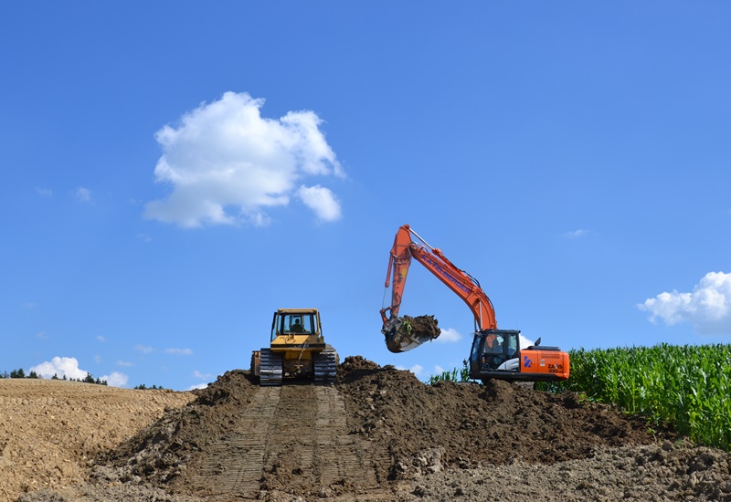 Erdbau Erdarbeiten Sand Wandschotter Rundkorn Kantkorn Rollierung Schotter Kies Humus Aushub Schottergrube Deponie Bagger LKW Sattel Baustelle Baustellen Fotos Materialien Humus Kies r Hochbau Tiefbau 2